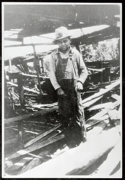 Framed Print : Boy Working at Saw Mill