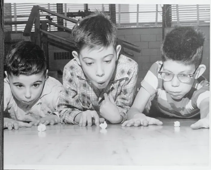 Framed Print : Boys Blowing Paper Scraps