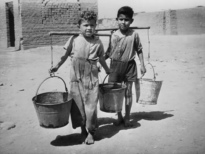 Framed Print : Boys Carrying Buckets of Water Framed Print : Boys Carrying Buckets of Water