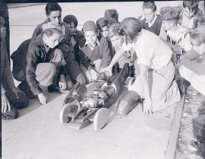 Framed Print : Boys Examining Model Speed Car