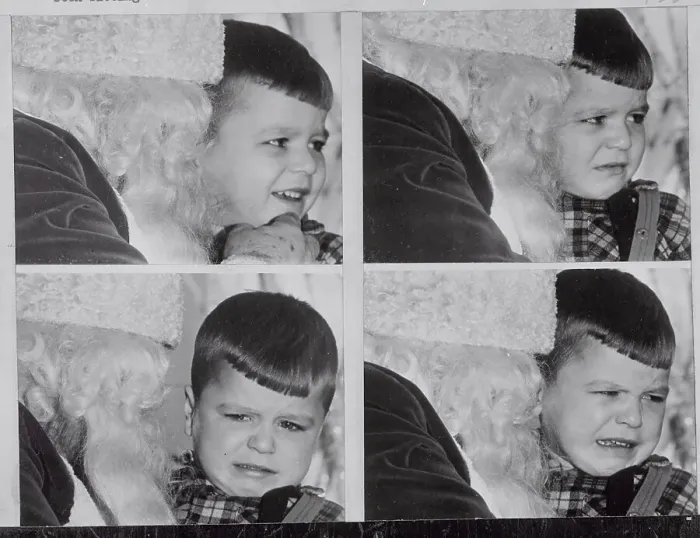 Framed Print : Boy's Facial Changes While on Santa's Knee Framed Print : Boy's Facial Changes While on Santa's Knee