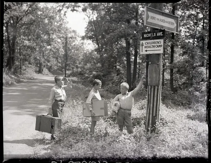 Framed Print : Boys Looking At Sign To Health Camp Framed Print : Boys Looking At Sign To Health Camp