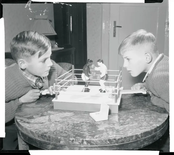 Framed Print : Boys Playing With a Boxing Toy Framed Print : Boys Playing With a Boxing Toy