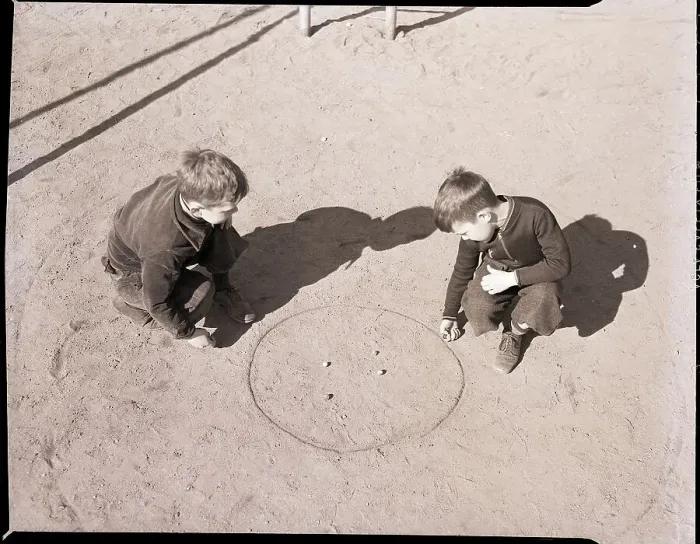 Framed Print : Two Boys Playing Marbles