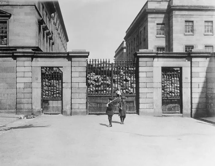 Framed Print : Boys Pretending to be Soldiers in Front of Building