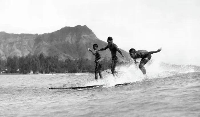 Framed Print : Boys Surfing; Mountains In Background Framed Print : Boys Surfing; Mountains In Background