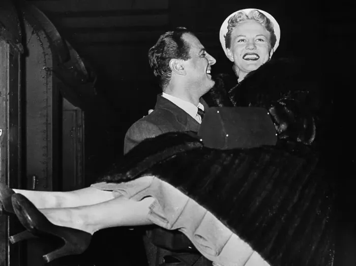 Framed Print : Brad Dexter Carrying Peggy Lee