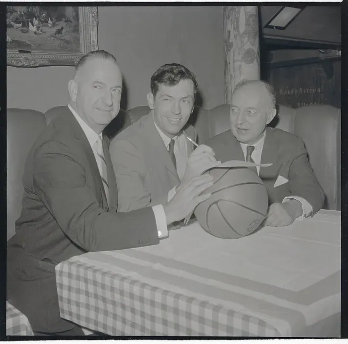 Framed Print : Bill Bradley and Basketball Officials Sitting with Basketball