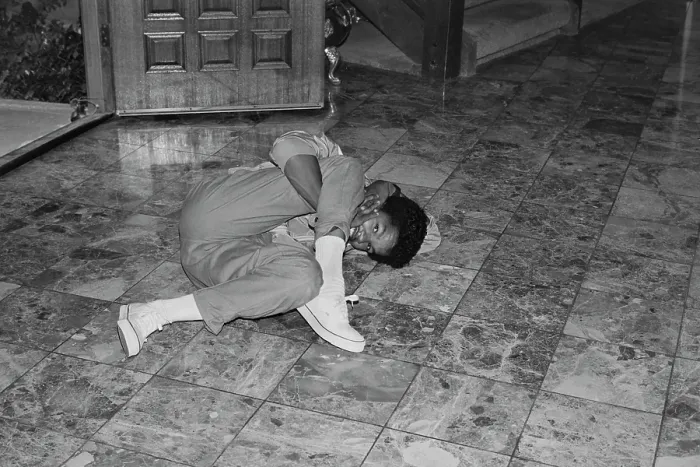 Framed Print : Breakin. A breakdancer reclining on a marble-effect tiled floor, United States, circa 1985 Framed Print : Breakin. A breakdancer reclining on a marble-effect tiled floor, United States, circa 1985