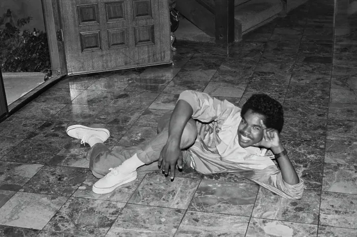 Framed Print : Breakin. A breakdancer reclining on a marble-effect tiled floor, United States, circa 1985 Framed Print : Breakin. A breakdancer reclining on a marble-effect tiled floor, United States, circa 1985