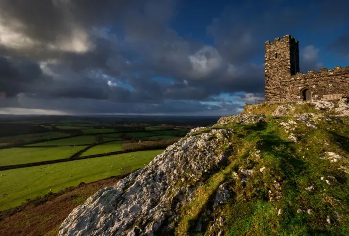 Framed Print : Brentor. Landscape over St Michaels church on Brentor, Dartmoor, during a showery day Framed Print : Brentor. Landscape over St Michaels church on Brentor, Dartmoor, during a showery day
