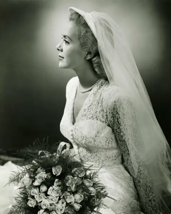 Framed Print : Bride with bouquet posing in studio, (B&W), portrait