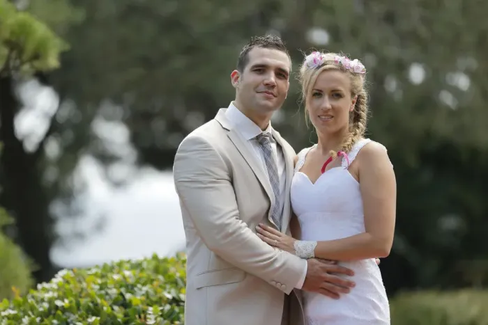 Framed Print : Bride and groom posing in a park Framed Print : Bride and groom posing in a park