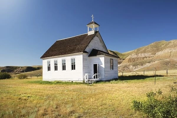Bright white little church in the badlands