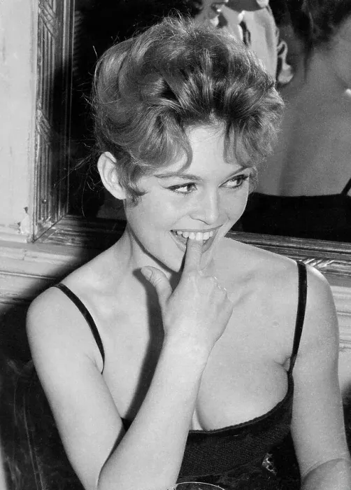 Framed Print : Brigitte Bardot With Her Finger In Mouth Framed Print : Brigitte Bardot With Her Finger In Mouth