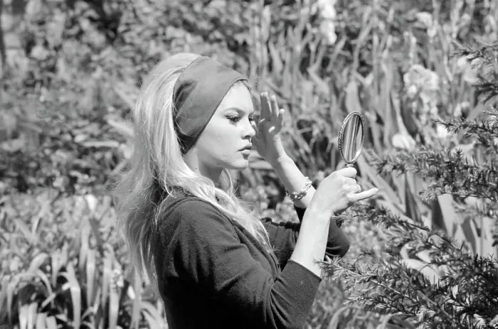 Framed Print : Brigitte Bardot Looking Through Magnifying Glass Framed Print : Brigitte Bardot Looking Through Magnifying Glass