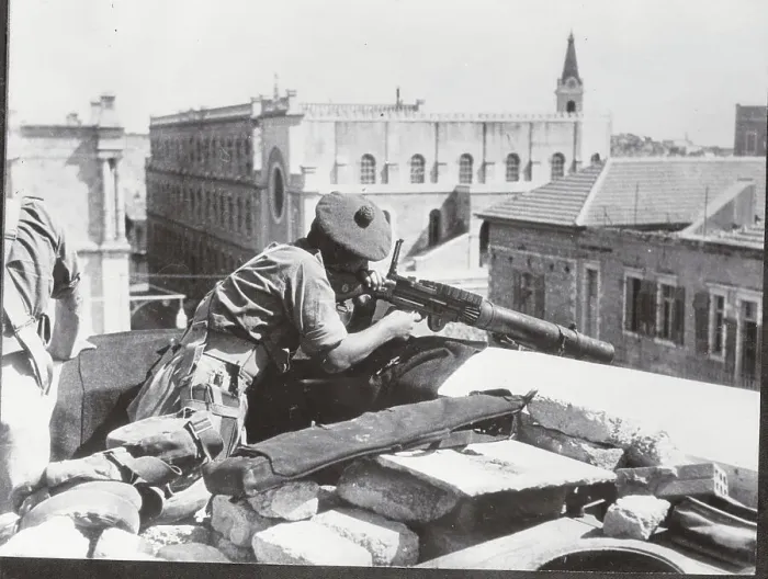 Framed Print : British Soldier Taking Aim with Weapon from Rooftop Framed Print : British Soldier Taking Aim with Weapon from Rooftop