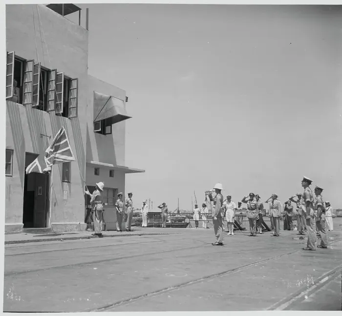 Framed Print : British Troop Lowering Flag