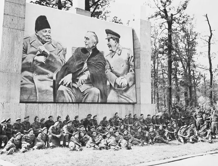 Framed Print : British Troops Rest Under Huge Poster Framed Print : British Troops Rest Under Huge Poster