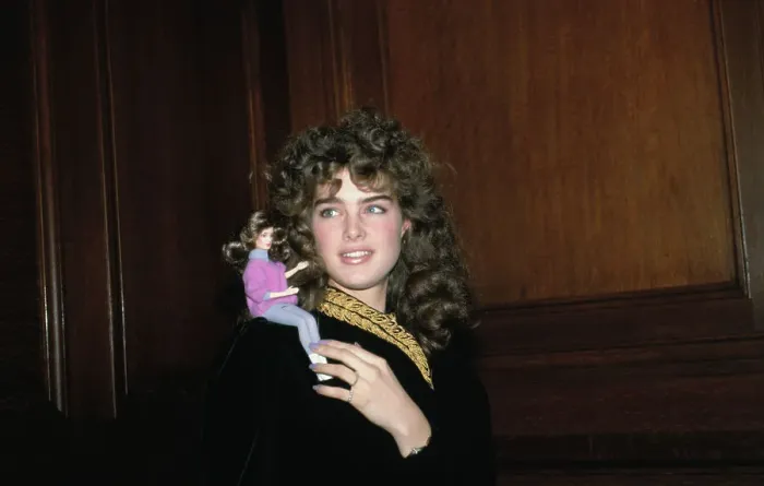 Framed Print : Brooke Shields with Tiny Doll Framed Print : Brooke Shields with Tiny Doll