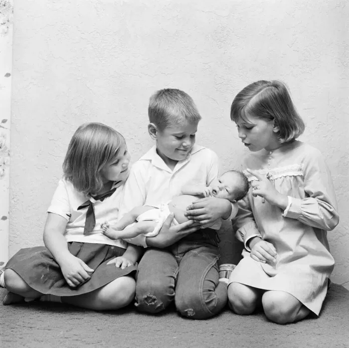 Framed Print : Brother holding baby sister, two sisters looking Framed Print : Brother holding baby sister, two sisters looking
