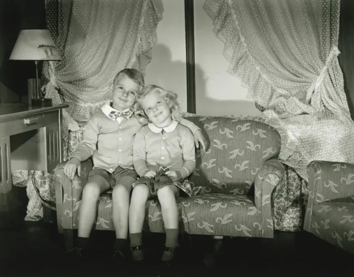 Framed Print : Brother and sister (4-5) posing in room, (B&W), portrait Framed Print : Brother and sister (4-5) posing in room, (B&W), portrait