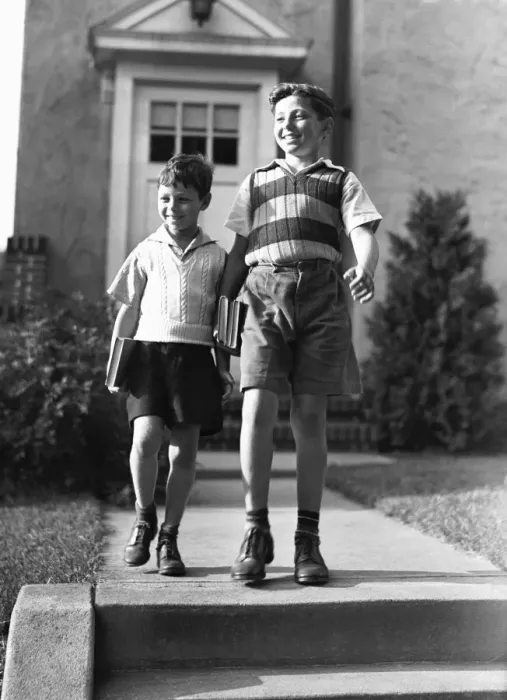 Framed Print : Two brothers (6-7, 10-11) on way to school, (B&W) Framed Print : Two brothers (6-7, 10-11) on way to school, (B&W)