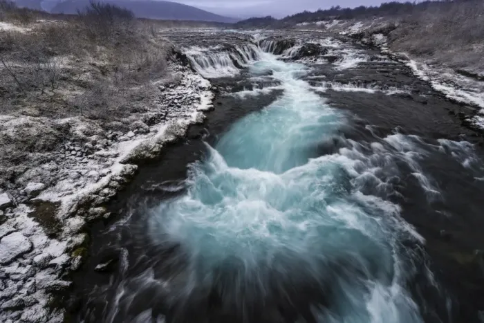 Framed Print : Bruarfoss. The waterfall at Bruarfoss cascades over a rift or fault in the river bed