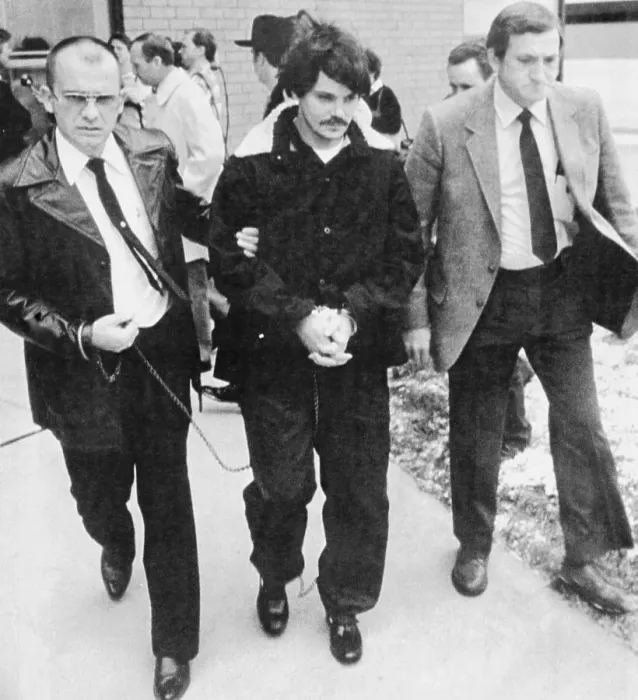 Framed Print : Bruce Davis with Two Officers