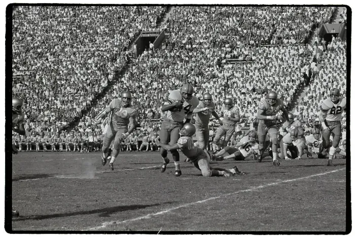 Framed Print : Bruin Tackling Syracuse Players Framed Print : Bruin Tackling Syracuse Players
