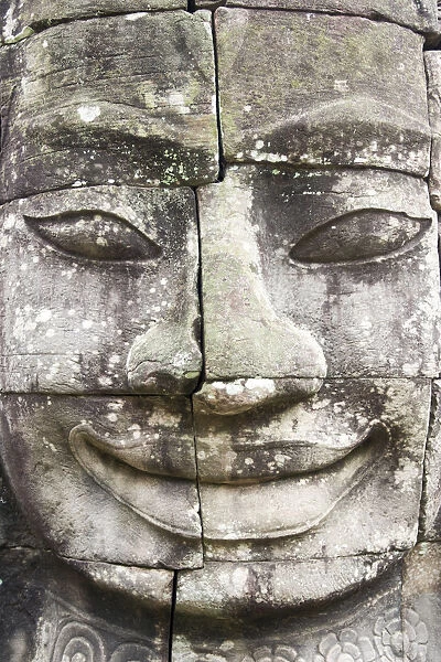 Buddha giant face carved in pillars Bayon Temple