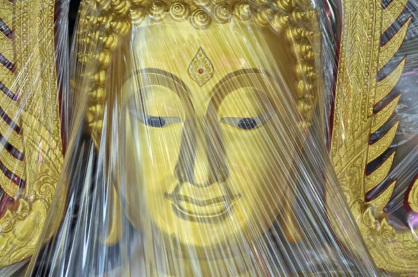Buddha statue covered with plastic foil, produced in a small factory, Bamrung Muang Road, Bangkok, Thailand, Asia, PublicGround