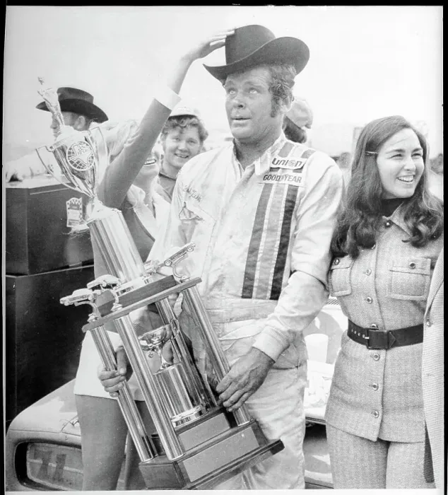 Framed Print : Buddy Baker Holding Trophy