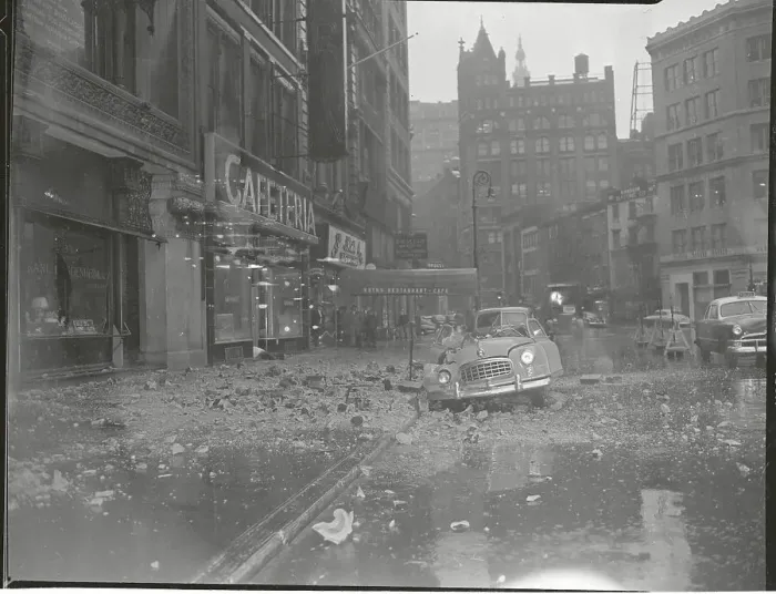 Framed Print : Building Debris on Street