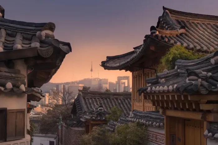 Framed Print : Bukchon Hanok village with Seoul city background Framed Print : Bukchon Hanok village with Seoul city background