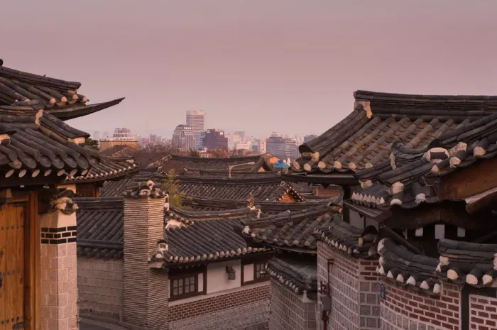 Framed Print : Bukchon Hanok village with Seoul city background Framed Print : Bukchon Hanok village with Seoul city background