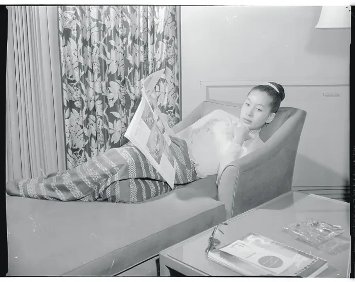 Framed Print : Burmese Woman Reclining on Sofa Framed Print : Burmese Woman Reclining on Sofa