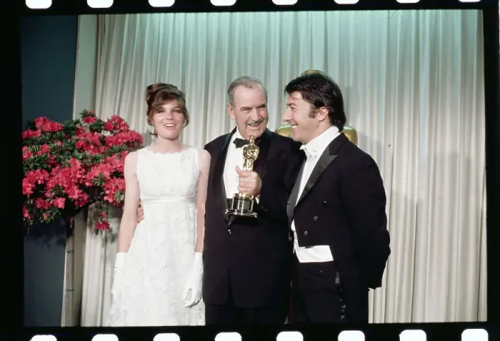 Framed Print : Burnett Guffey Holding His Trophy While Posing With Movie Stars Framed Print : Burnett Guffey Holding His Trophy While Posing With Movie Stars