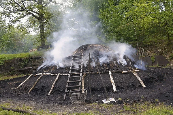 Burning charcoal pile in the final stage, Walpersdorf, Siegen-Wittgenstein district, North Rhine-Westphalia, Germany, Europe