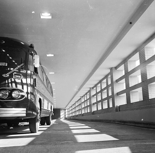 Bus Dock. circa 1955: A bus in the bus docks at New Yorks East Side Airlines Terminal