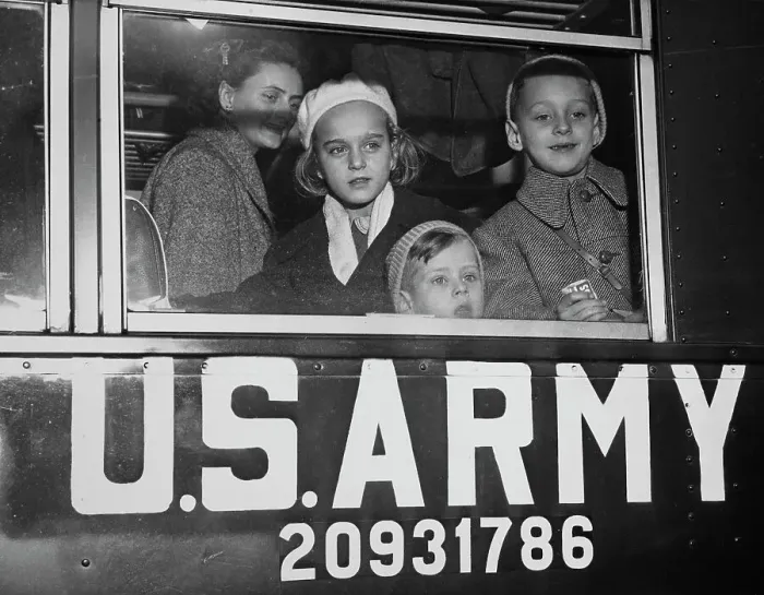 Framed Print : Bus Stop. Three Hungarian refugees look out the window of an army bus at Framed Print : Bus Stop. Three Hungarian refugees look out the window of an army bus at
