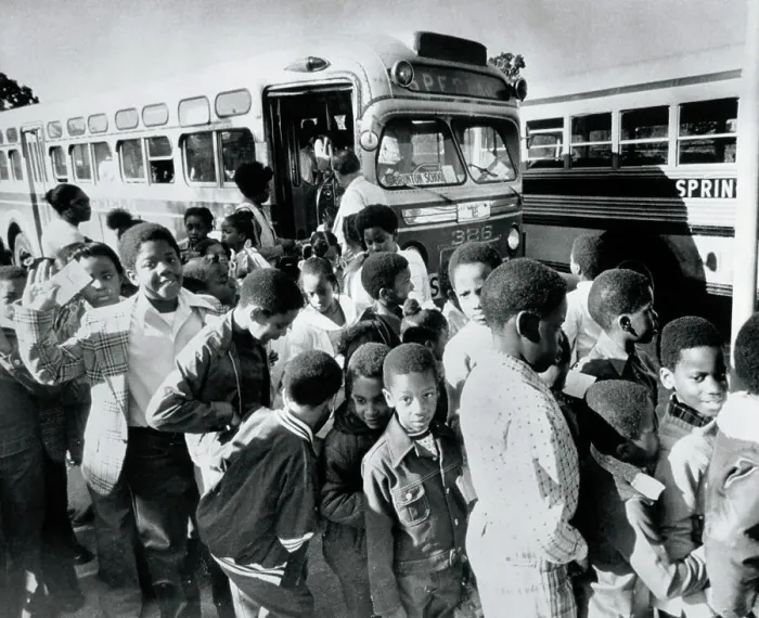Framed Print : Bused Students Disembarking from Bus Framed Print : Bused Students Disembarking from Bus