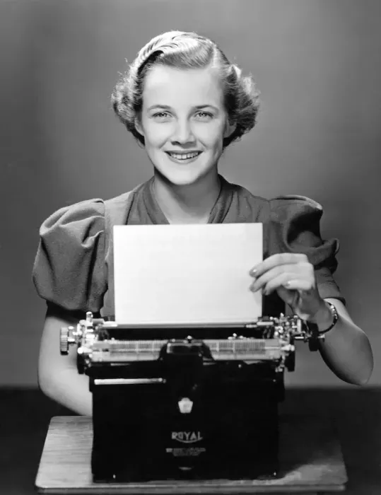 Framed Print : Business woman / secretary at typewriter Framed Print : Business woman / secretary at typewriter