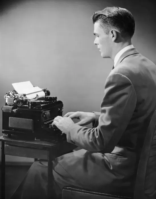 Framed Print : Businessman inside office typing Framed Print : Businessman inside office typing