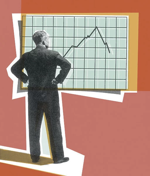 Businessman Looking at a Graph