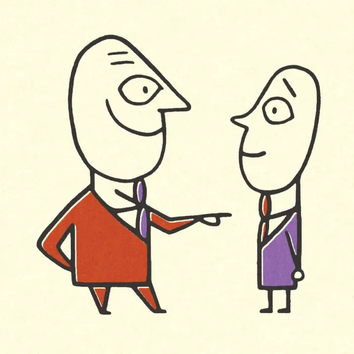 Framed Print : Businessman Pointing at a Colleague Framed Print : Businessman Pointing at a Colleague