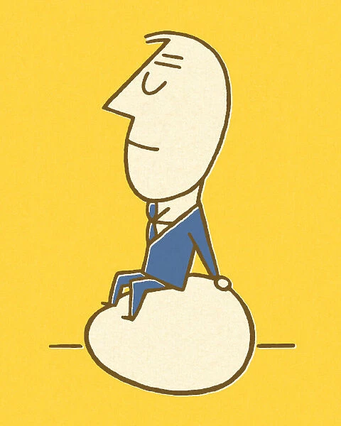 Businessman Sitting on an Egg