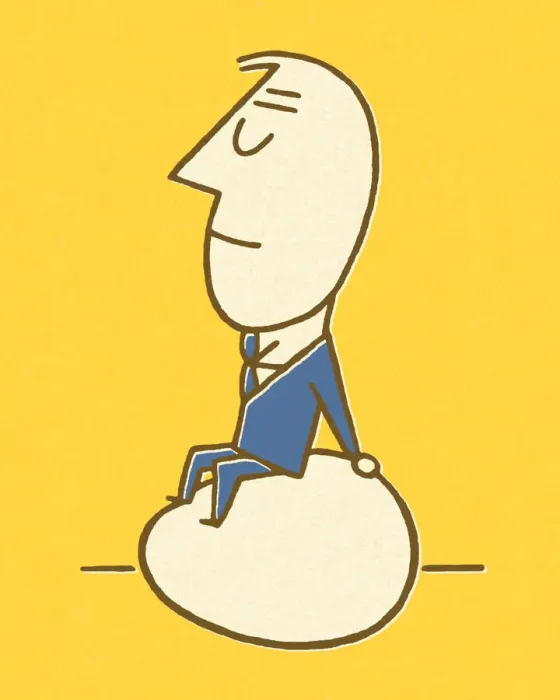 Framed Print : Businessman Sitting on an Egg Framed Print : Businessman Sitting on an Egg