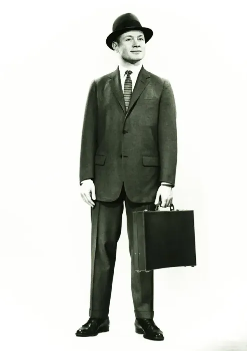 Framed Print : Businessman standing in studio, (B&W), portrait Framed Print : Businessman standing in studio, (B&W), portrait