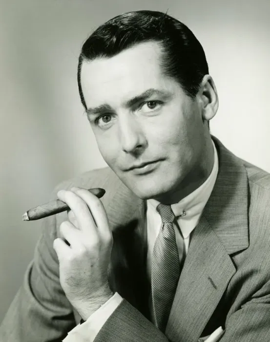 Framed Print : Businessman in studio holding cigar, (B&W), portrait Framed Print : Businessman in studio holding cigar, (B&W), portrait